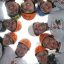 Oxfordshire I.M.P.S. team group hug looking down