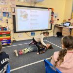 image of children doing the recovery position in the Falkland Islands